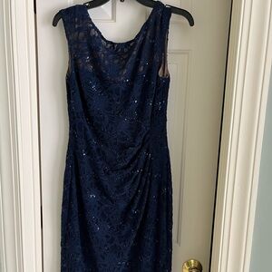 Great cocktail dress - navy  blue with sequins throughout.